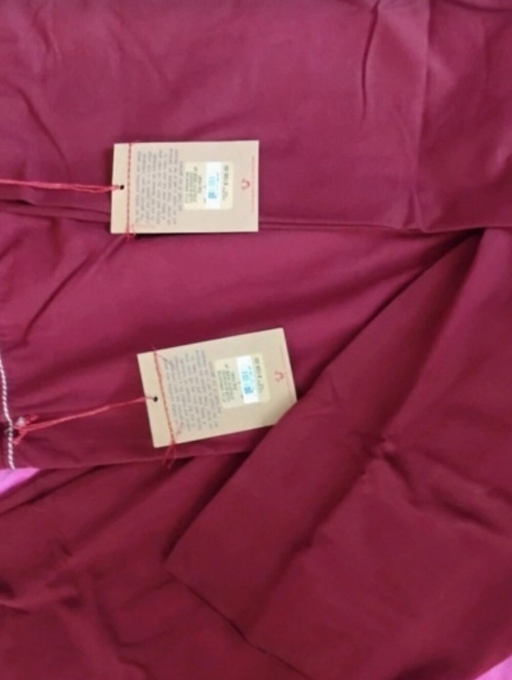2 large True Religion Flared Leggings in Burgundy Red